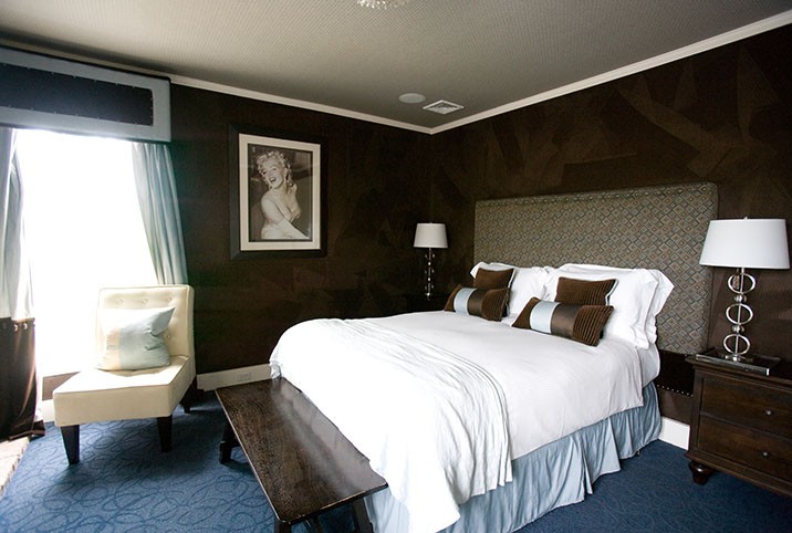 Cocoa Room, brown suede walls, fireplace, king bed